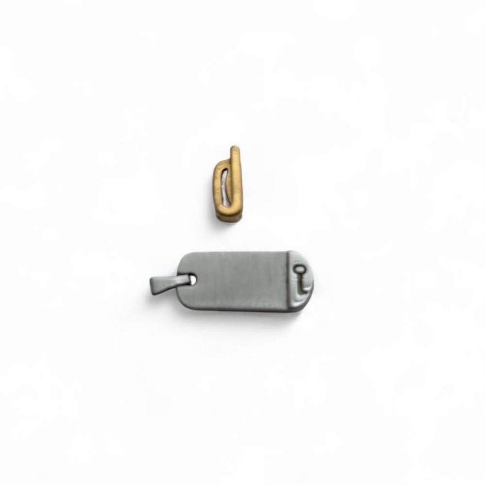Silver dog tag with Gold detachable letter “J” Pendant